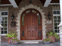 round top mahogany entry door