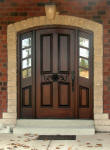arched carved wood door