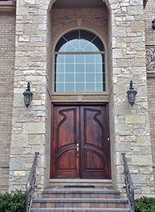 carved exterior mahogany double doors