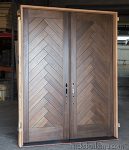 Custom Ordered Mahogany Double Doors with Herringbone Panel Design