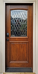 Mahogany 2 Panel Exterior Door with Arched Glass Application