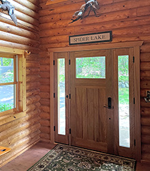 inside view of craftsman door on log cabin