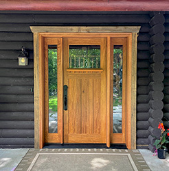Craftsman door on log cabin