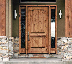 rustic entry door with sidelights