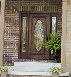 mahogany front door with full oval glass