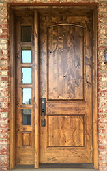 rustic wood entry doors and sidelites
