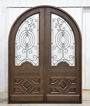 arched top double doors with wrought iron
